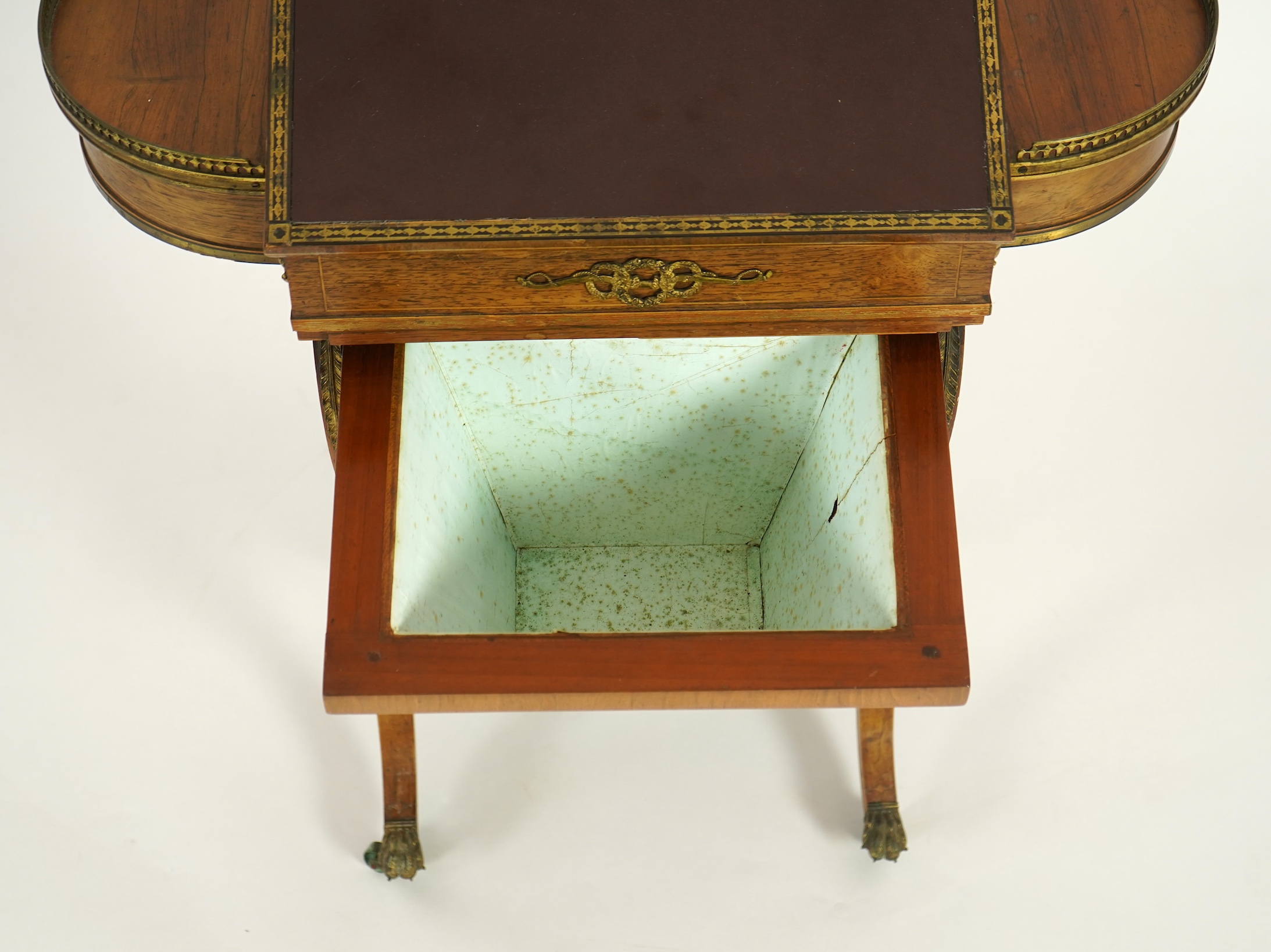 A Regency brass mounted rosewood writing, games and work table